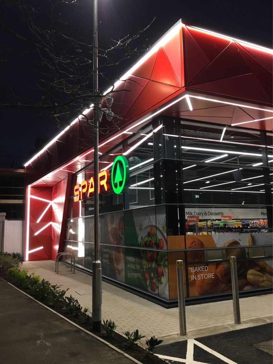 SPAR Whitewell corner store at night